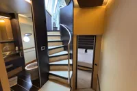 Interior of 2006 Azimut 86S yacht with modern staircase and luxurious cabin.
