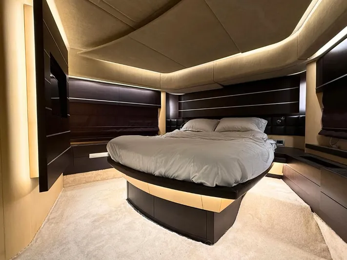  Yacht Photos Pics Luxurious bedroom interior of 2006 Azimut 86S yacht with modern design and ambient lighting.