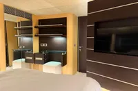 Luxurious interior of 2006 Azimut 86S yacht with modern furnishings and sleek design.