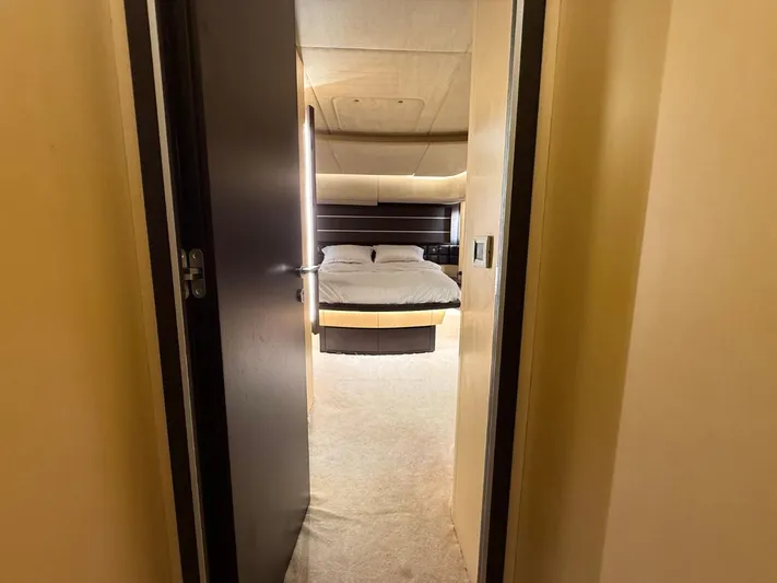  Yacht Photos Pics Luxurious bedroom interior of 2006 Azimut 86S yacht, featuring a cozy bed and elegant design.