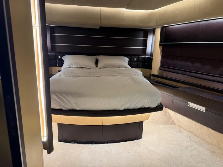  Yacht Photos Pics Luxurious bedroom interior of a 2006 Azimut 86S yacht with modern design elements.