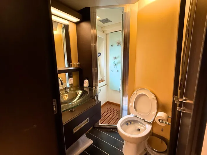  Yacht Photos Pics Luxurious bathroom in a 2006 Azimut 86S yacht, featuring modern fixtures and elegant design.