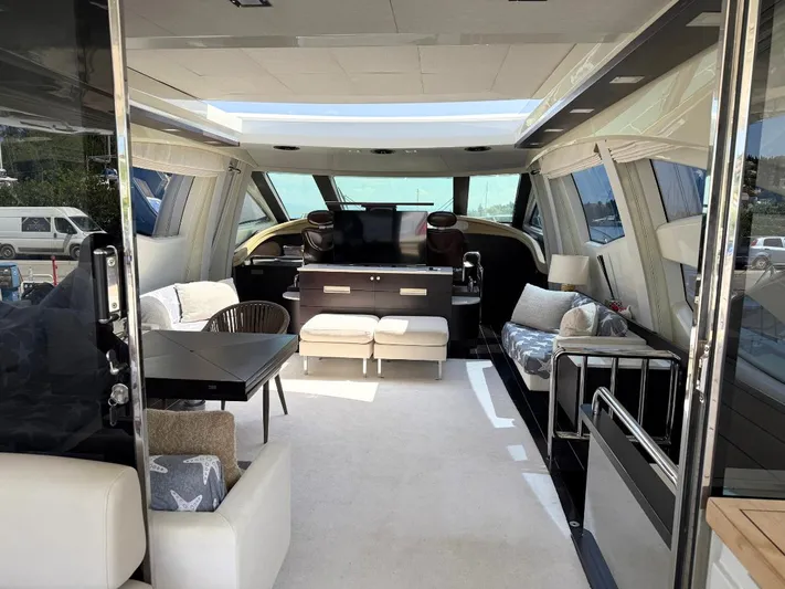  Yacht Photos Pics Luxurious interior of a 2006 Azimut 86S yacht with modern furnishings and ample natural light.