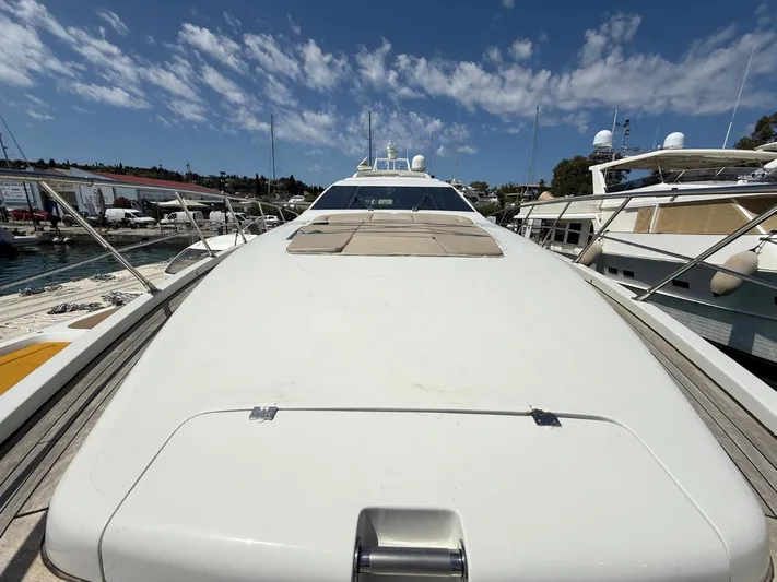  Yacht Photos Pics Luxury 2006 Azimut 86S yacht docked at marina under blue sky.