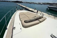 2006 Azimut 86S yacht docked at marina, featuring spacious sun deck.