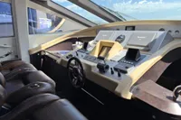 Luxurious 2006 Azimut 86S yacht cockpit with modern navigation controls and leather seating.