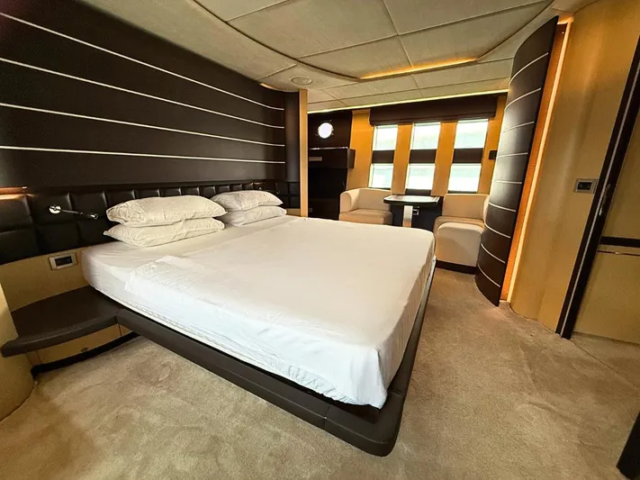  Yacht Photos Pics Luxurious bedroom interior of 2006 Azimut 86S yacht with modern design and elegant furnishings.