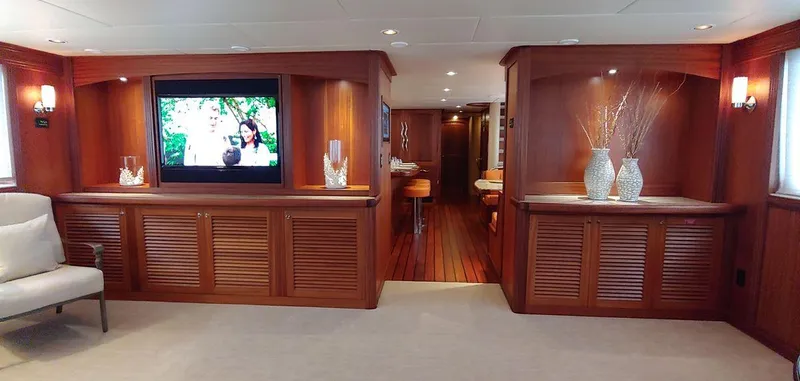 Allseas Yacht Photos Pics Luxurious interior of 2016 Allseas Expedition 92 yacht with wooden cabinetry and modern decor.