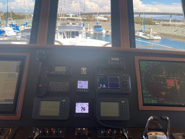 Allseas Yacht Photos Pics Allseas Expedition 92 2016 yacht control panel with navigation instruments and marina view.