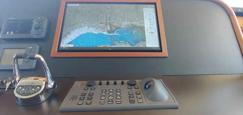 Allseas Yacht Photos Pics Control panel and navigation screen of a 2016 Allseas Expedition 92 yacht.