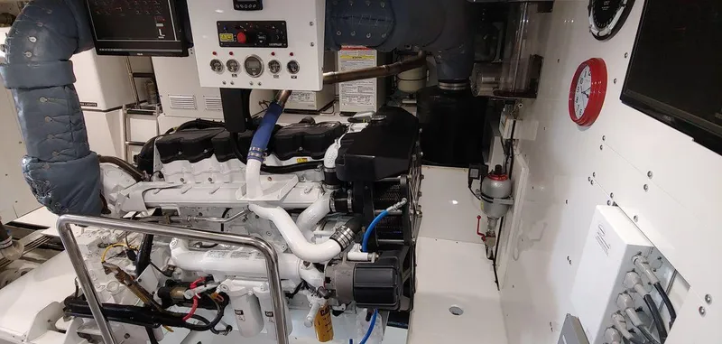 Allseas Yacht Photos Pics Engine room of a 2016 Allseas Expedition 92 yacht with control panel and machinery.