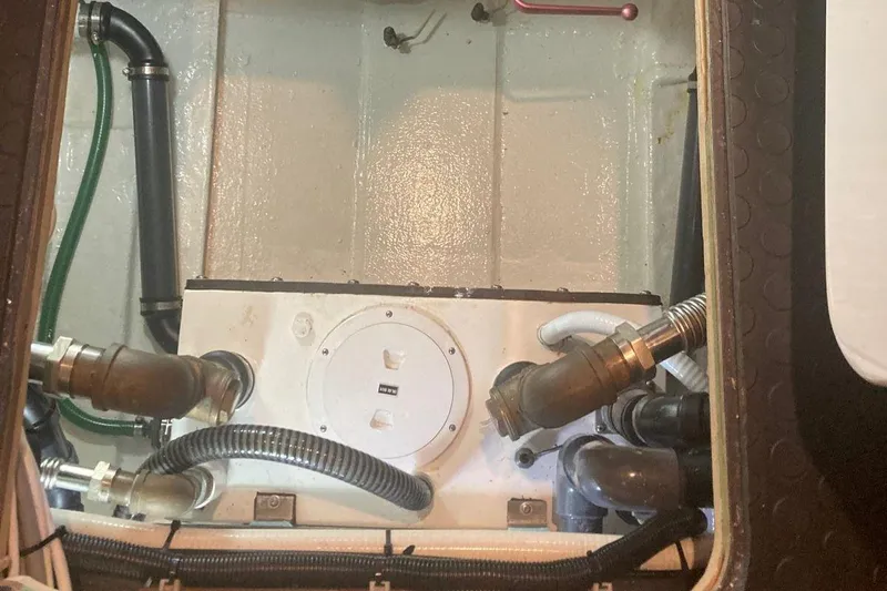 Allseas Yacht Photos Pics Engine room of a 2016 Allseas Expedition 92 yacht with various pipes and fittings.