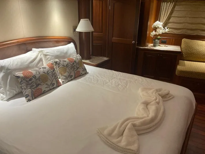 Allseas Yacht Photos Pics Luxurious bedroom on the 2016 Allseas Expedition 92 yacht with elegant decor.