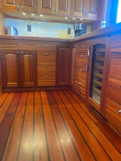 Allseas Yacht Photos Pics Luxurious wooden kitchen interior of 2016 Allseas Expedition 92 yacht.