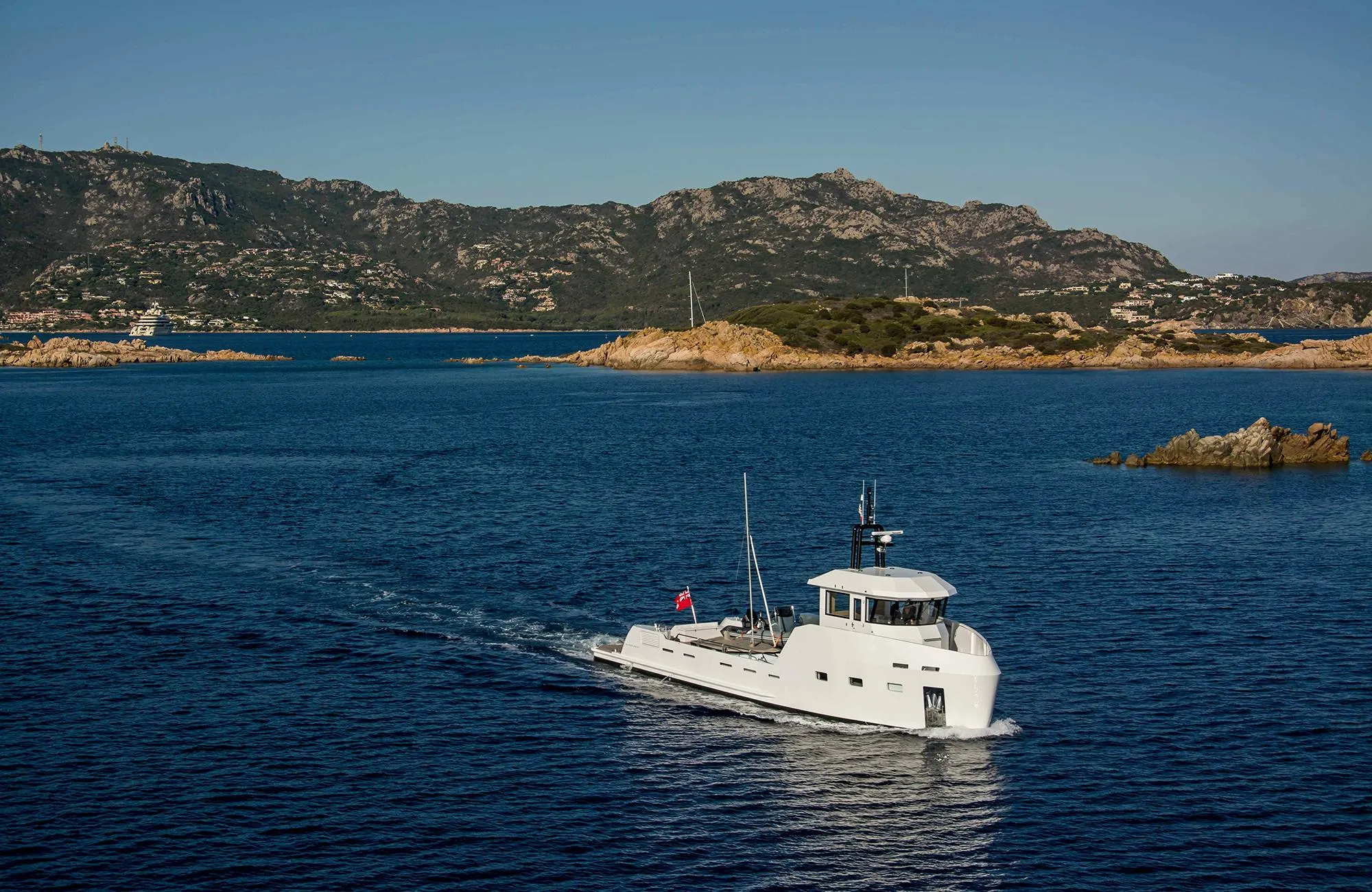 2027 Outer Reef Yachts 20 YXT cruising in scenic coastal waters.