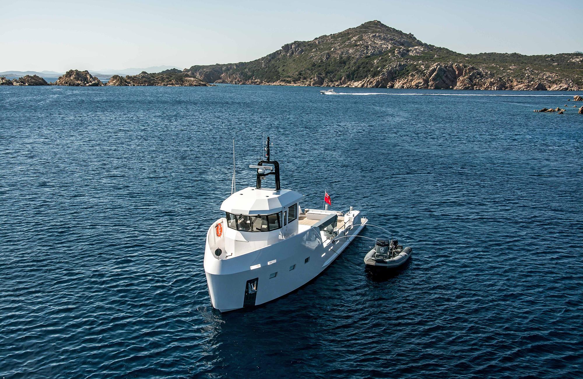 Outer Reef Yachts 20 YXT 2027 cruising in scenic coastal waters.