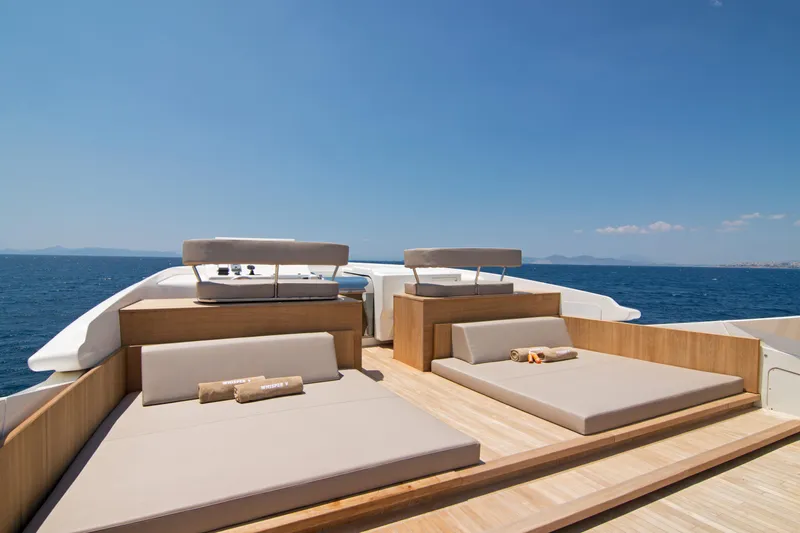 Whisper V Yacht Photos Pics Luxurious sun deck on 2002 Ferretti Yachts 112 Custom Line, overlooking the ocean.