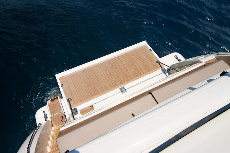 Whisper V Yacht Photos Pics Ferretti Yachts 112 Custom Line 2002, teak swim platform, ocean view.