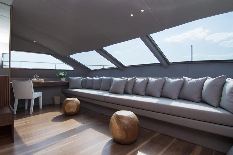 Whisper V Yacht Photos Pics Luxurious interior of 2002 Ferretti Yachts 112 Custom Line with skylights and plush seating.