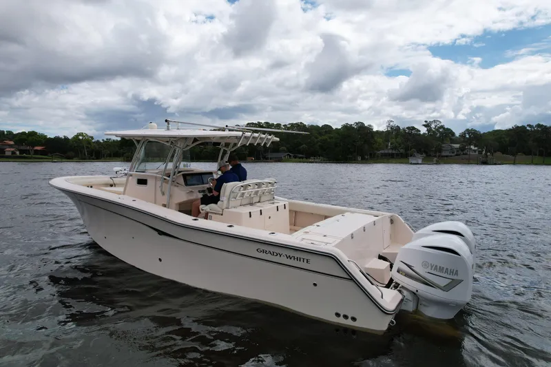  Yacht Photos Pics 2008 Grady-White Canyon 336 boat on a lake with Yamaha engines.