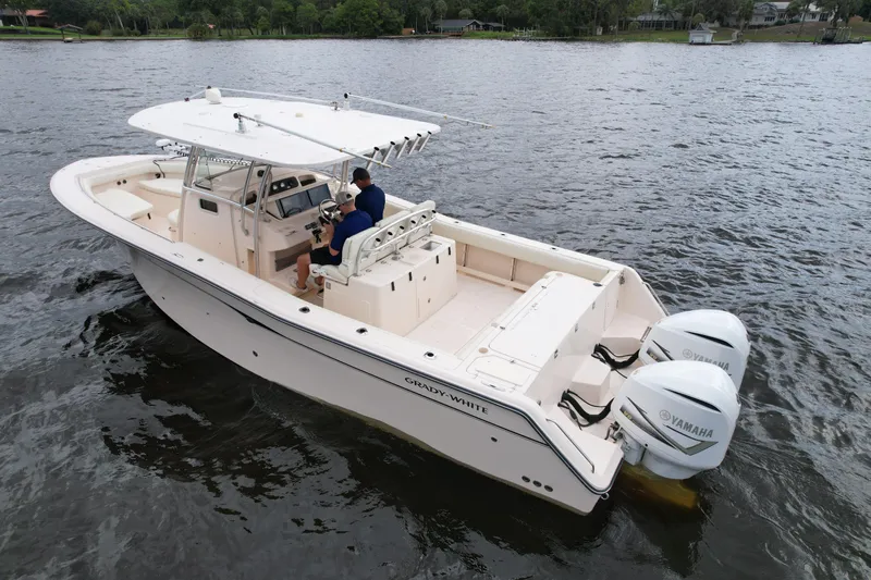  Yacht Photos Pics 2008 Grady-White Canyon 336 boat on water with dual Yamaha engines.