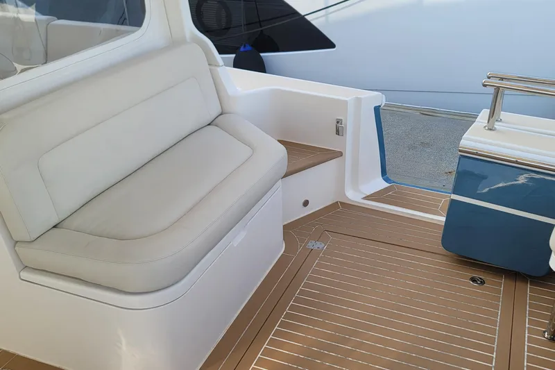Future 7 Yacht Photos Pics Luxurious seating area on a 2018 MJM 50z yacht with teak flooring.