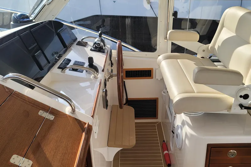 Future 7 Yacht Photos Pics Luxurious helm of 2018 MJM 50z yacht with modern controls and comfortable seating.