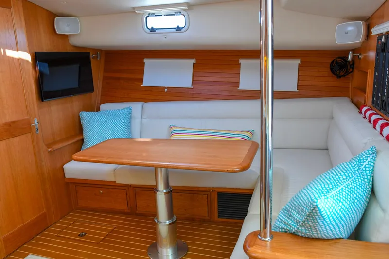 Future 7 Yacht Photos Pics Luxurious interior of 2018 MJM 50z yacht with cozy seating and wooden accents.