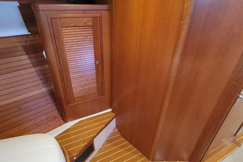 Future 7 Yacht Photos Pics Interior of 2018 MJM 50z yacht featuring wooden cabinetry and flooring.