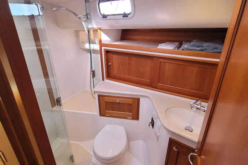 Future 7 Yacht Photos Pics Luxurious bathroom in 2018 MJM 50z yacht with wooden cabinetry and modern fixtures.