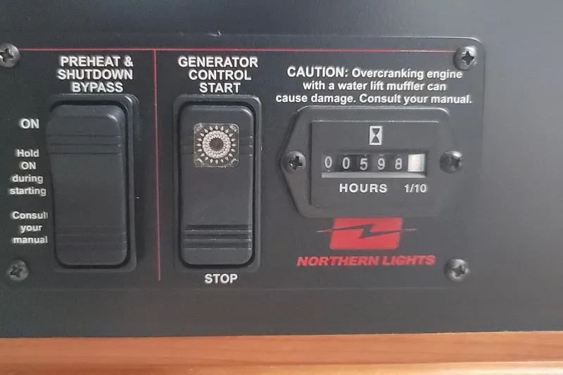 Future 7 Yacht Photos Pics Control panel of Northern Lights generator on 2018 MJM 50z boat, showing 598 hours.