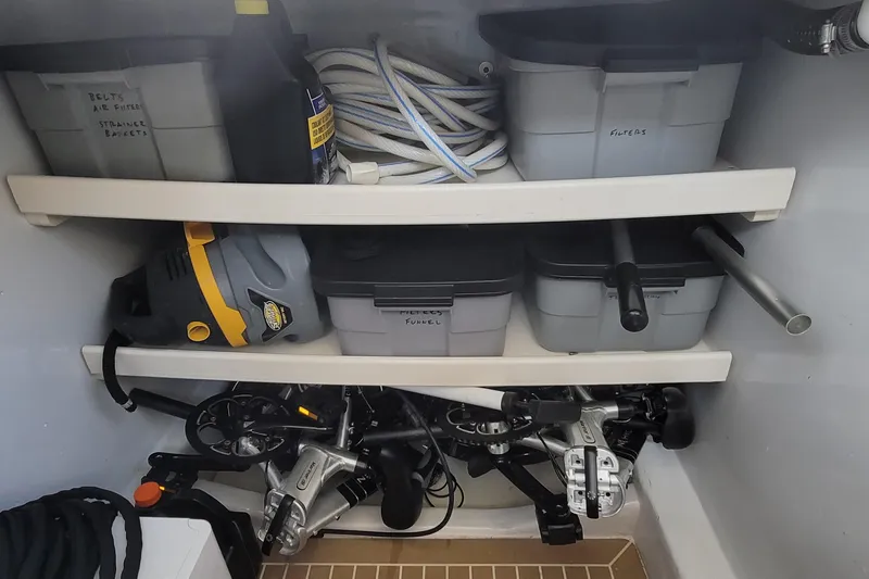 Future 7 Yacht Photos Pics Storage area on 2018 MJM 50z boat with tools, containers, and equipment.