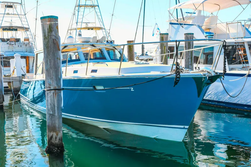 Future 7 Yacht Photos Pics 2018 MJM 50z yacht docked in marina, surrounded by other boats.
