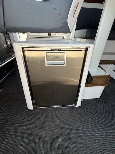  Yacht Photos Pics Stainless steel refrigerator in 2021 Axopar 37 XC CROSS CABIN boat interior.