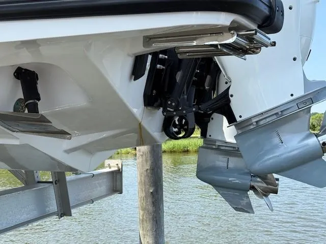  Yacht Photos Pics 2021 Axopar 37 XC CROSS CABIN boat stern with dual outboard motors.