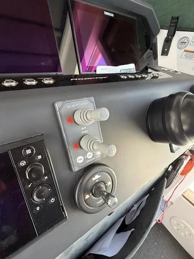  Yacht Photos Pics Control panel of 2021 Axopar 37 XC CROSS CABIN boat with navigation equipment.