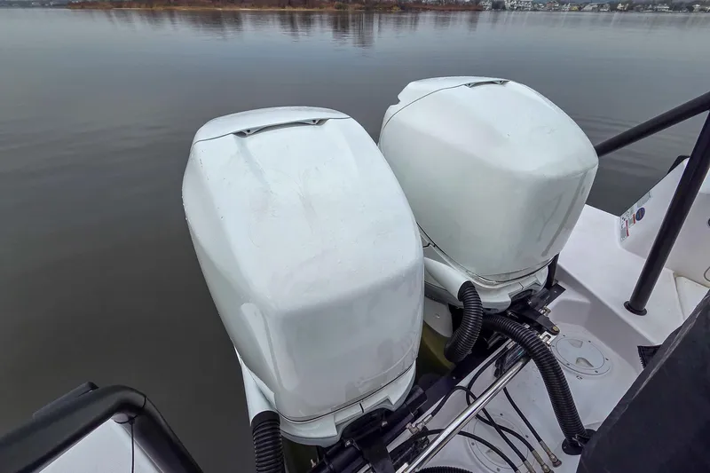  Yacht Photos Pics Twin outboard engines on a 2021 Axopar 37 XC Cross Cabin boat.