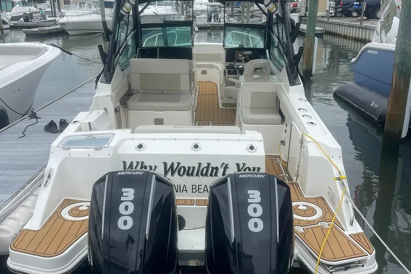 Why Wouldn't You Yacht Photos Pics 2023 Boston Whaler 280 Vantage boat with twin Mercury 300 engines docked at marina.