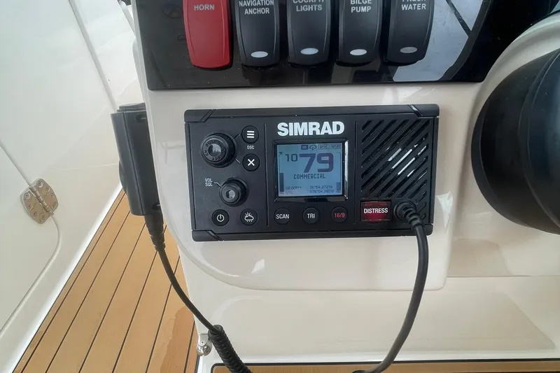 Why Wouldn't You Yacht Photos Pics Control panel of 2023 Boston Whaler 280 Vantage with Simrad marine radio.