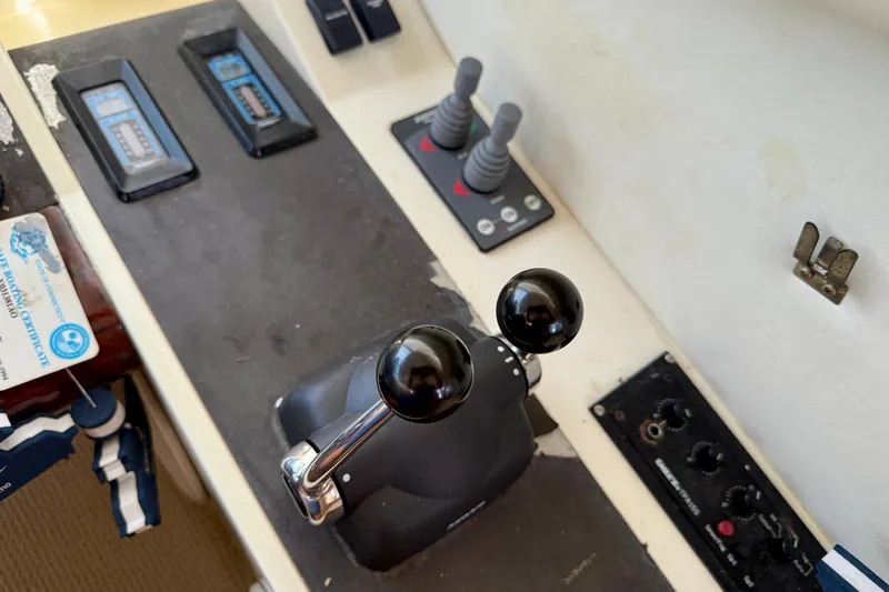  Yacht Photos Pics Control panel of a 2000 Fairline Squadron 56 yacht with throttle levers and gauges.