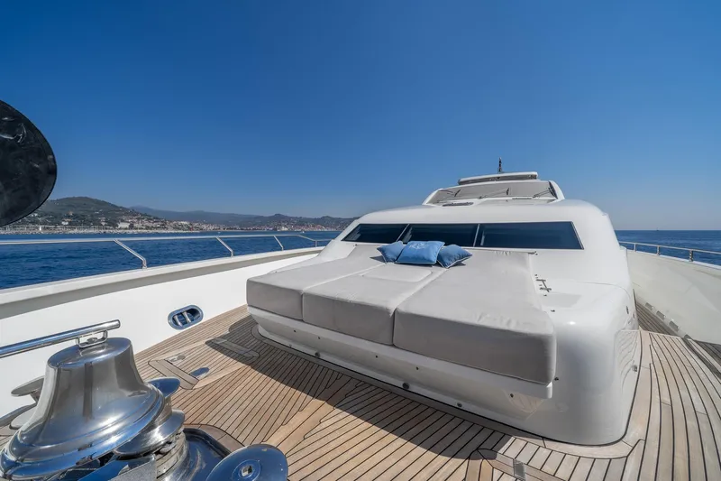 Arion Yacht Photos Pics Luxurious 2011 Guy Couach 121' yacht deck with sunbed and ocean view.