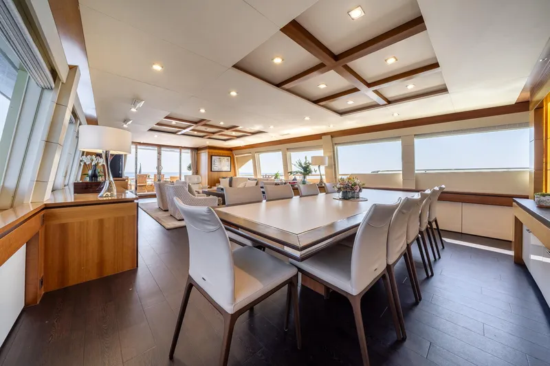 Arion Yacht Photos Pics Luxurious interior of 2011 Guy Couach 121' yacht with elegant dining area.