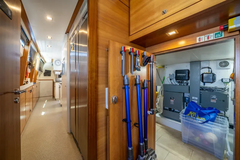 Arion Yacht Photos Pics Interior of 2011 Guy Couach 121' yacht, featuring storage and equipment room.