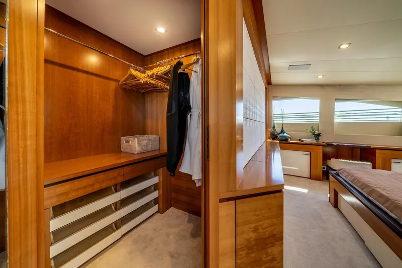 Arion Yacht Photos Pics Luxurious wooden closet and bedroom interior on 2011 Guy Couach 121' yacht.