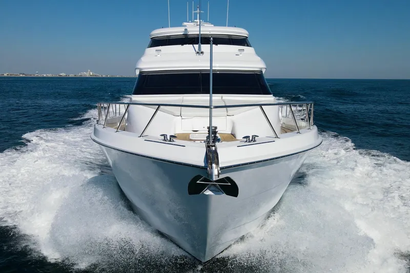 Time-2 Fly Yacht Photos Pics 2006 Hatteras 80 Motor Yacht Sky Lounge cruising on open water.