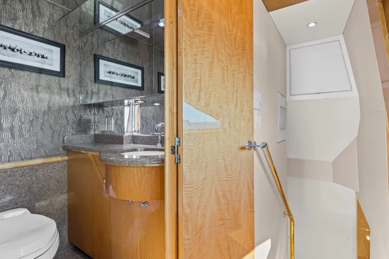 Time-2 Fly Yacht Photos Pics Luxurious bathroom interior on 2006 Hatteras 80 Motor Yacht Sky Lounge.