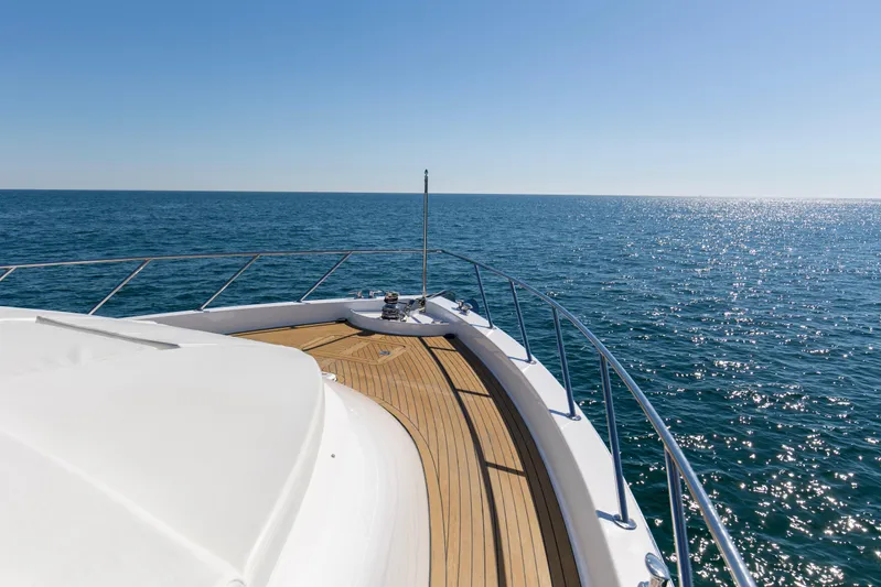 Time-2 Fly Yacht Photos Pics Bow view of 2006 Hatteras 80 Motor Yacht Sky Lounge on open sea.