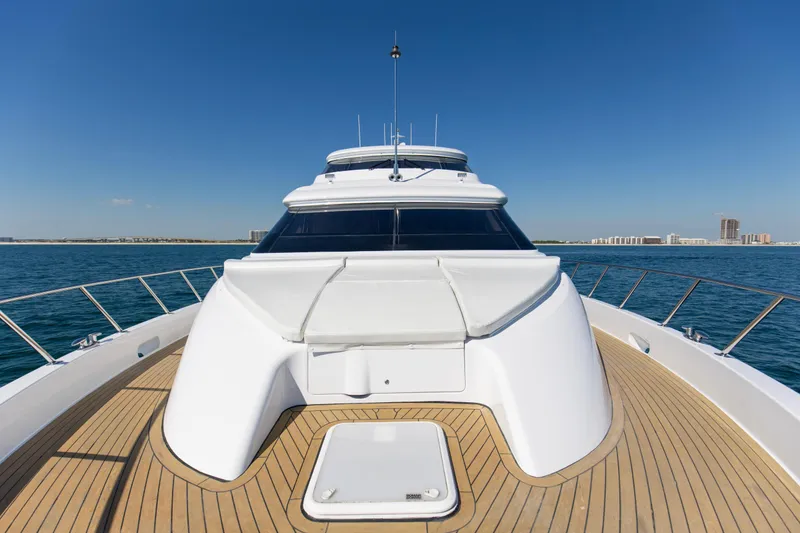 Time-2 Fly Yacht Photos Pics 2006 Hatteras 80 Motor Yacht Sky Lounge on open water, showcasing sleek design and spacious deck.