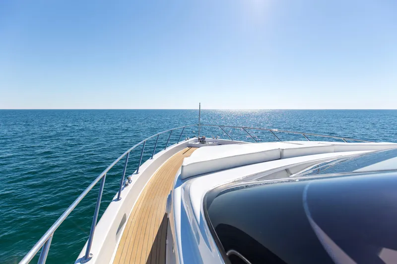 Time-2 Fly Yacht Photos Pics Bow view of 2006 Hatteras 80 Motor Yacht Sky Lounge on open sea.