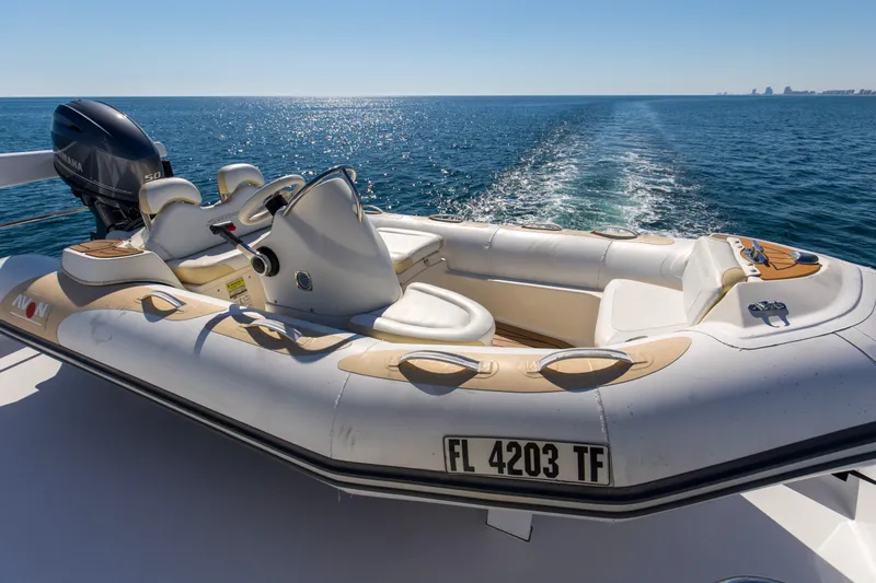 Time-2 Fly Yacht Photos Pics Inflatable boat on Hatteras 80 Motor Yacht Sky Lounge, 2006, cruising on open sea.